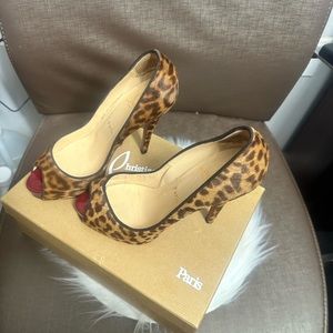 Christian Louboutin size 7.5